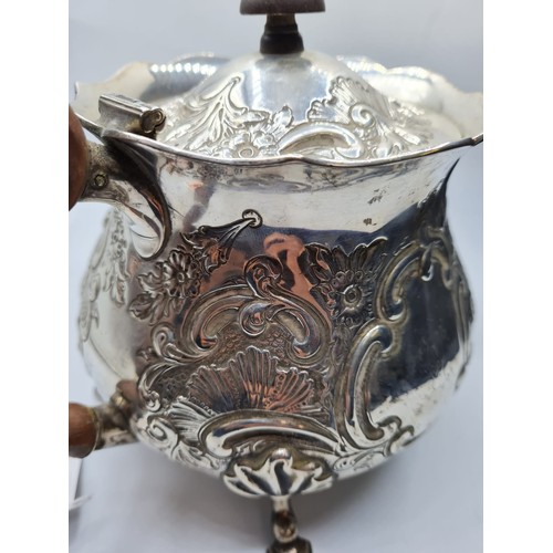 30 - An Ornate Silver Teapot with clear London Hallmark 1920,  766g weight and 15cm tall