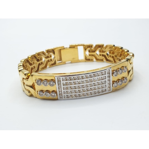 529 - 18ct diamond encrusted bracelet, weight 54.2g and 34cm long