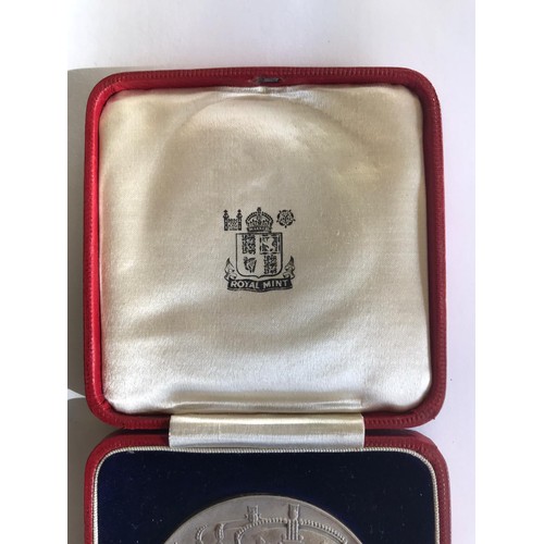 521 - A cased George and Mary Jubilee medal in fine condition.