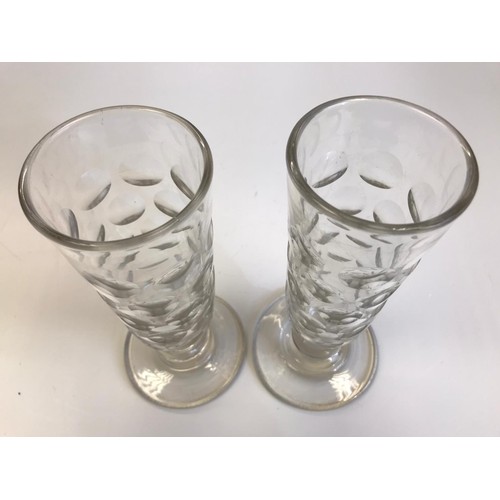 523 - Two Georgian hand blown glasses of tapered cylindrical form on a wide foot and polished pontils, hei... 