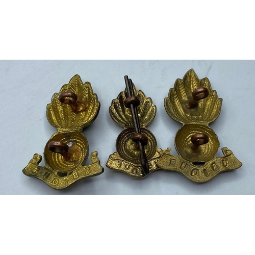 391 - Royal Artillery brass UBIQUE with a pair of collar badges matching