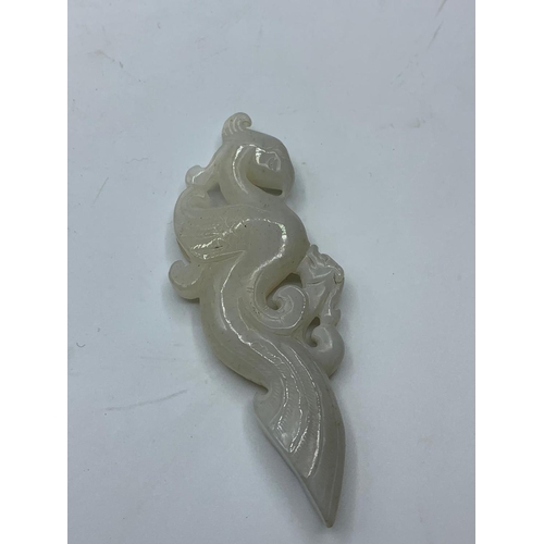 143 - Chinese white jade artefact, 34g weight and 8.5cm tall