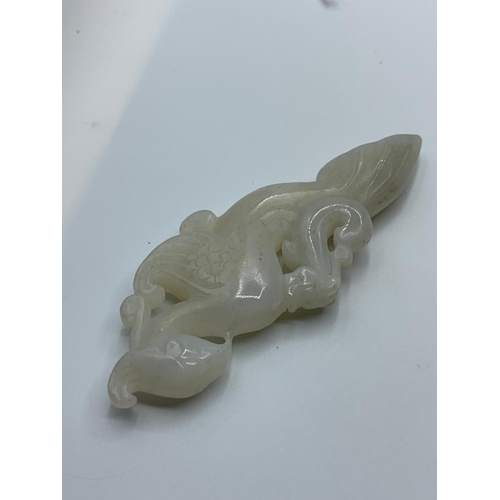 143 - Chinese white jade artefact, 34g weight and 8.5cm tall