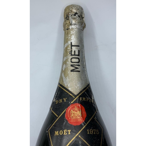 20 - A 1975 Magnum of Moet and Chandon champagne