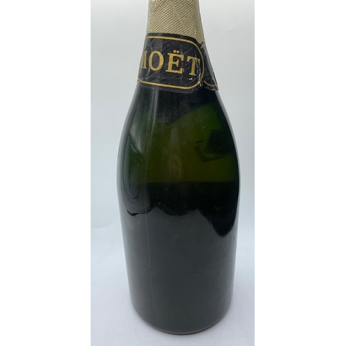 20 - A 1975 Magnum of Moet and Chandon champagne