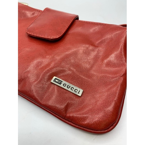 21 - GUCCI leather clutch bag from 1970's