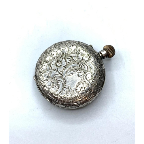 351 - Antique silver ladies open face pocket watch, having chased scroll engraving, top winding with ename... 