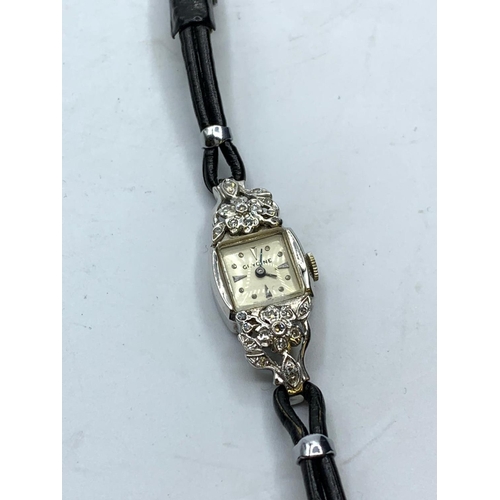 76 - 14k diamond gold and platinum cocktail watch circa 1940 full working order, weight 12g and face 1.5c... 