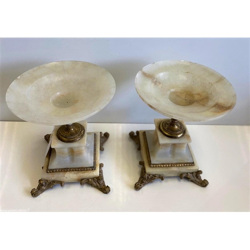 336 - A pair of ornate onyx display plinths, 19cm tall and 3540g weight, a few marks from wear (AF)