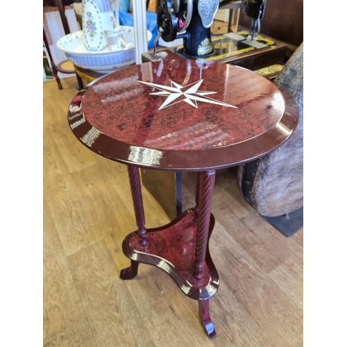 228 - Mahogany occasional TABLE with twist legs and inlaid top.  66cm tall, 40cm diameter.