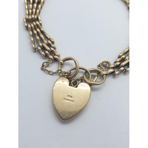 202 - Vintage 9ct gold gate style bracelet with heart padlock, weight 16.4g and 18cm long