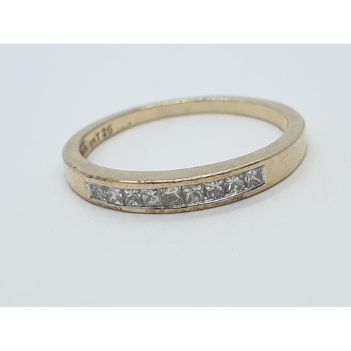 208 - 9CT Y/G DIAMOND CHANNEL SET HALF ETERNITY RING , WEIGHT 1.5G AND 0.25CT APPROX SIZE N1/2