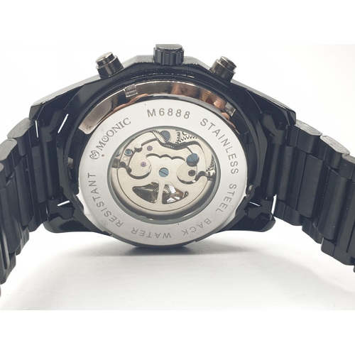 231 - Chronograph skeleton watch by ESS. Fully automatic with black and metal strap and bezel. Original bo... 