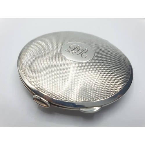 242 - Vintage silver compact. Engine turned design to top. Initialled cartouche and inscribed to base. Ful... 