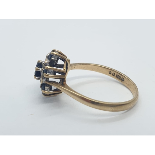 256 - 9CT Y/G DIAMOND AND SAPPHIRE CLUSTER RING, WEIGHT 2.2G AND SIZE N1/2