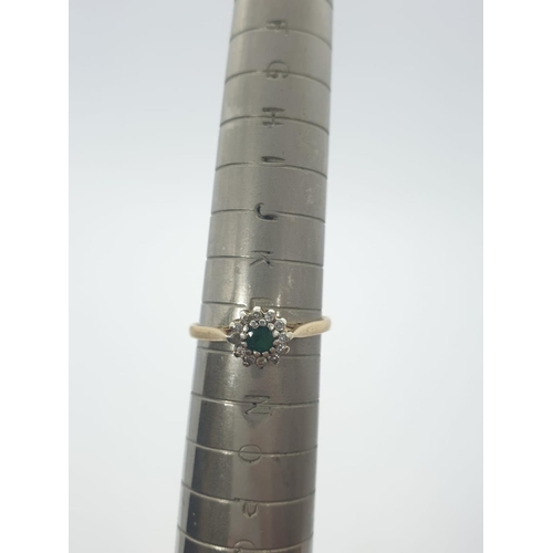 269 - 9CT Y/G DIAMOND & EMERALD CLUSTER RING, WEIGHT 1.3G AND SIZE L1/2