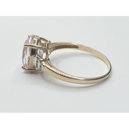 58 - 9ct gold RING having a large faceted oval morganite solitaire.  1.5ct to top.  Diamonds to shoulders... 