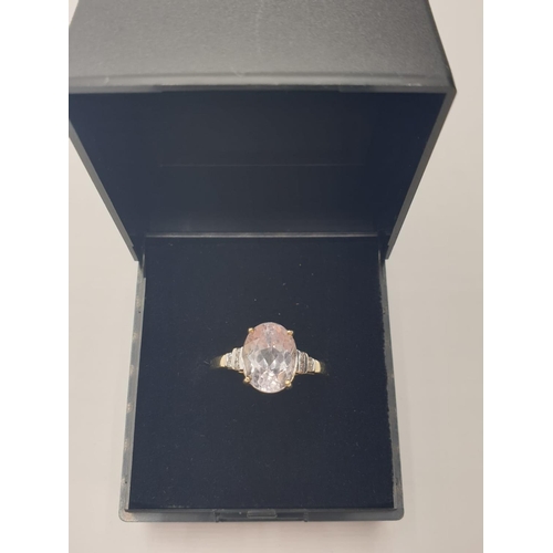 58 - 9ct gold RING having a large faceted oval morganite solitaire.  1.5ct to top.  Diamonds to shoulders... 