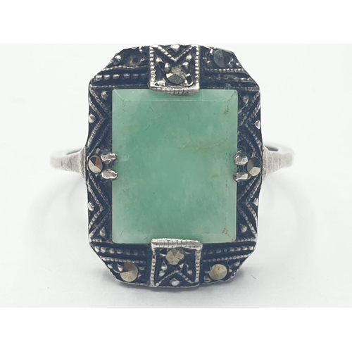 296 - Vintage silver and Jade art deco ring. Silver marcasite ring having polished jade in rectangular for... 