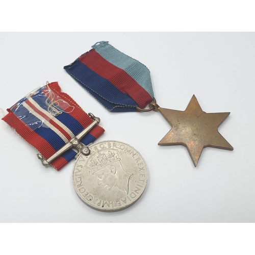 323 - Pair of World War II original medals to include the 1939-1945 Star and the 1939-1945 medal. Complete... 