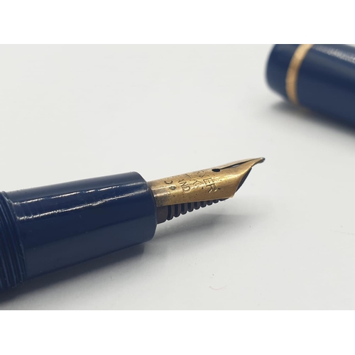 333 - Vintage Parker fountain pen. Blue with gold trim. Screw top model suction filling. 14ct gold nib