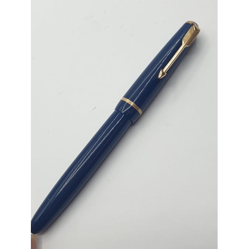 333 - Vintage Parker fountain pen. Blue with gold trim. Screw top model suction filling. 14ct gold nib