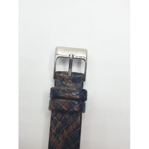 334 - Ladies Infinite Wristwatch Having Stainless Steel Square Face. Black x Brown Crocodile type strap. F... 