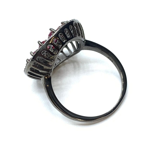 411 - Ladies Black 925 Sterling Silver Ring Set with Marquise Cat Rubies and White Stone Surround, Size P.