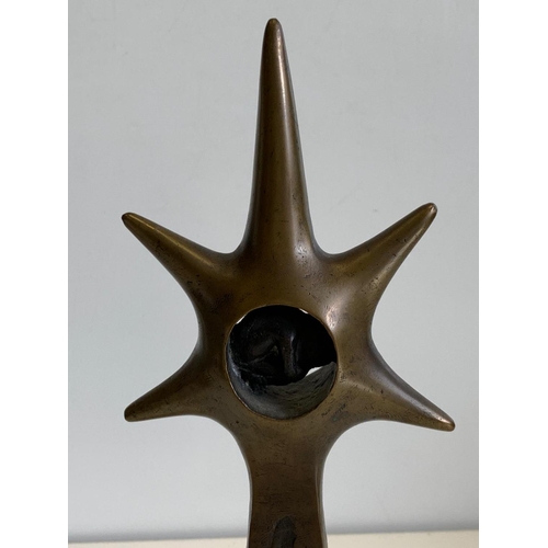 531 - Brass Ornament with a Phoetus in a Star Sculpture on Marble Plinth, 30cms Tall, 10x10cm Base.