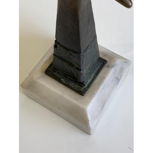 531 - Brass Ornament with a Phoetus in a Star Sculpture on Marble Plinth, 30cms Tall, 10x10cm Base.