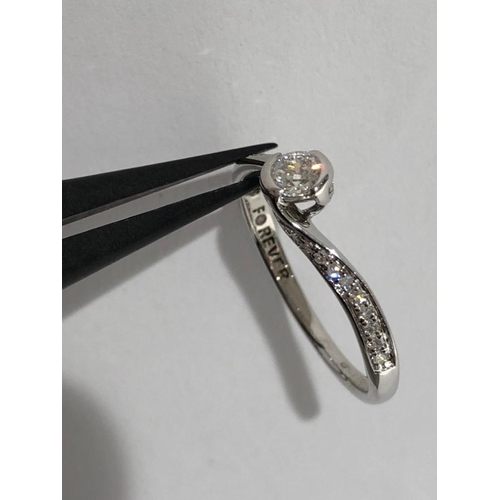 594 - Forever brand engagement ring- 18k white gold with diamonds 0.33cts; the centre diamond is around 0.... 