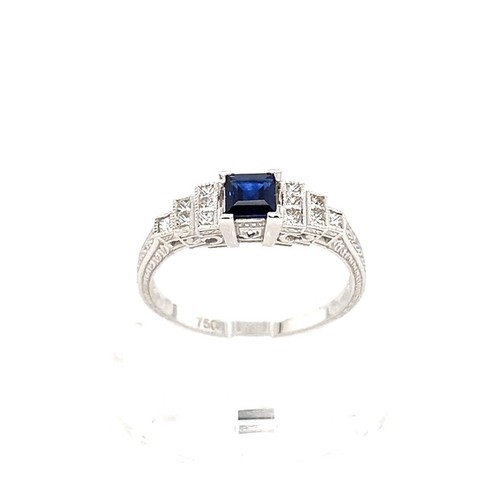 605 - 18k white gold ring with 0.35ct blue sapphire centre and 0.18cts diamonds on shoulders,  size M1/2