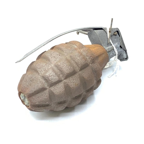 117 - WW2 INERT US Pineapple Grenade with a dummy fuze. The fuze is sprung and with release the level when... 