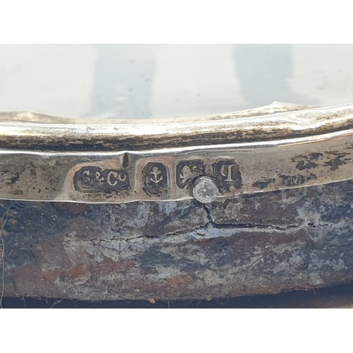 221 - Royal flying corps officers side cap, 1915 hallmarked silver framed photograph, bronze and cloth pil... 