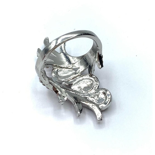 132 - A silver (stamped 925) dress ring with white and pink gems