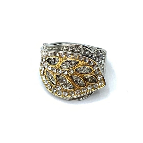 32 - A boxed silver and gold ring (stamped 925 and 750) with sapphires representing 
two overlapping leav... 