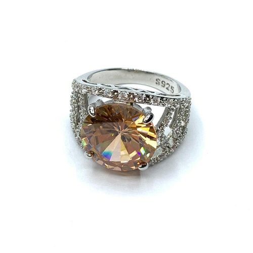 61 - A beautiful, silver (stamped S9250) ring with a large central stone (morganite?)
and surrounding sap... 