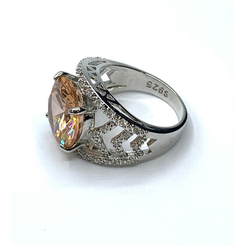 61 - A beautiful, silver (stamped S9250) ring with a large central stone (morganite?)
and surrounding sap... 