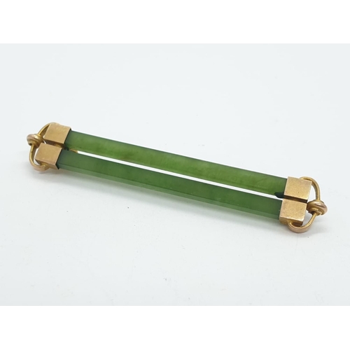 175 - 9ct gold and jade bar brooch, weight 2.9g, 4.5cm width