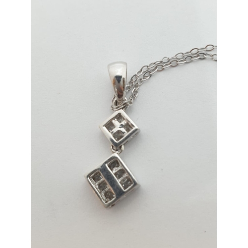 359 - 18ct Diamond PENDANT on 9ct chain.  1.6g   44cm