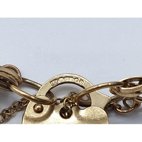 140 - 9ct gate BRACELET with heart padlock.  4.9g. 16cm.