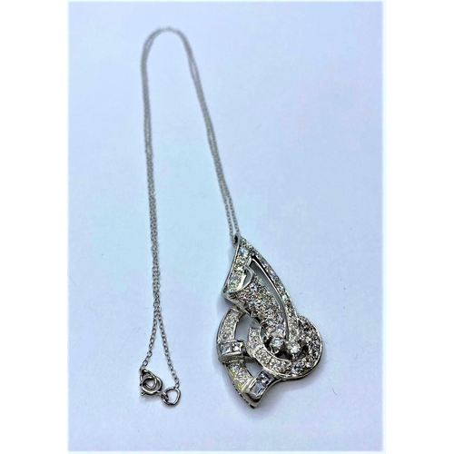 50 - Platinum and Diamond PENDANT; 8.2g    In excess of 2 ct of diamonds.