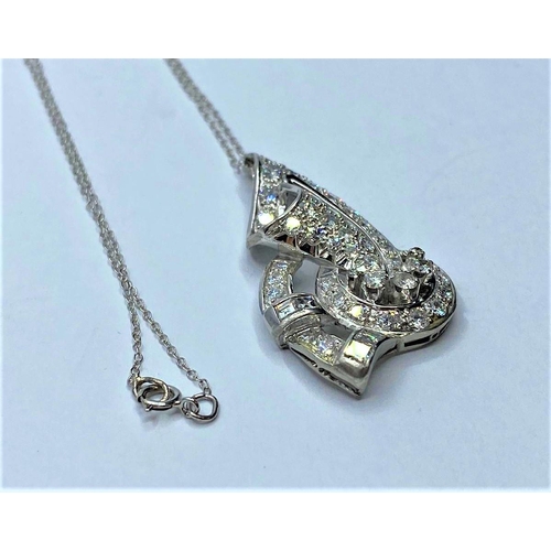 50 - Platinum and Diamond PENDANT; 8.2g    In excess of 2 ct of diamonds.