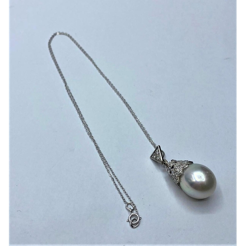 54 - South Sea pearl PENDANT with Diamonds .  18ct chain.  7.6g  40cm