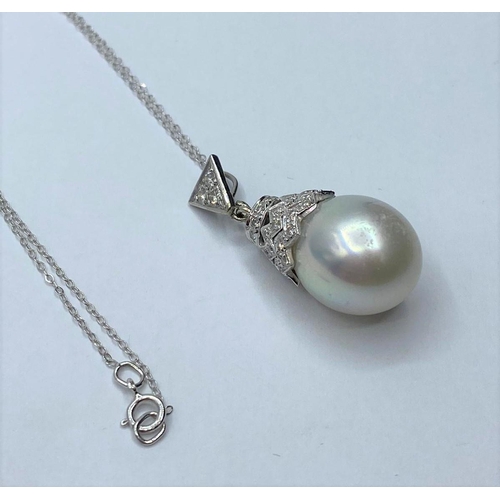 54 - South Sea pearl PENDANT with Diamonds .  18ct chain.  7.6g  40cm