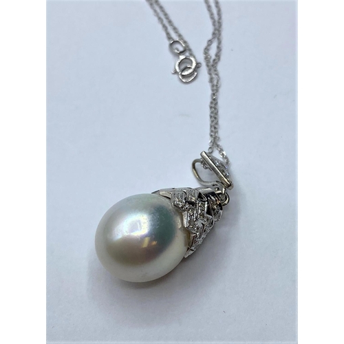 54 - South Sea pearl PENDANT with Diamonds .  18ct chain.  7.6g  40cm