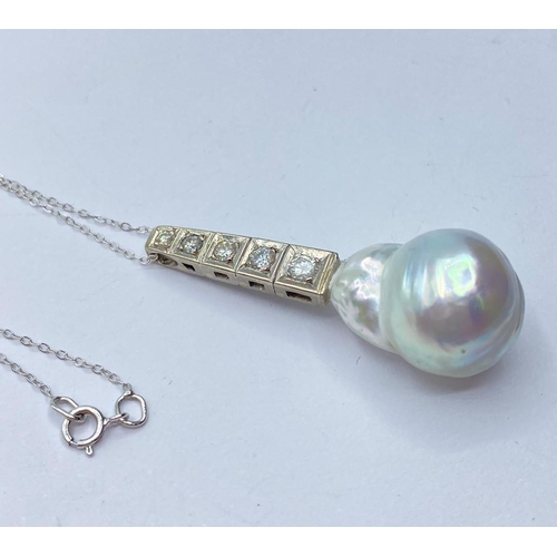 55 - South Sea Pearl  PENDANT with diamonds and platinum on 9ct gold chain.  8.3g   42cm