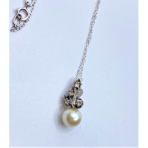 92 - Small 18ct pearl PENDANT with 9ct (44cm) chain.  1.9g