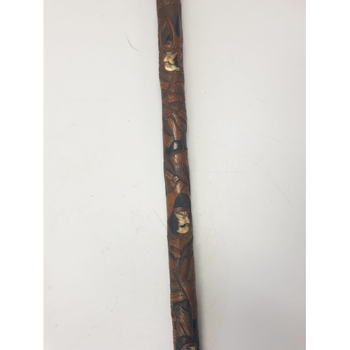 12 - An early Japanese BAMBOO WALKING STICK.  Hand carved with inlaid bone.  Signed by maker.