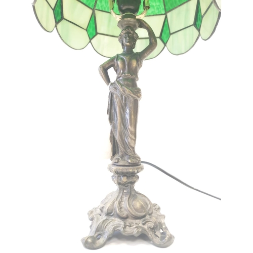 145 - Tiffany style LAMP. Lady  holding torch stem. Metal base.